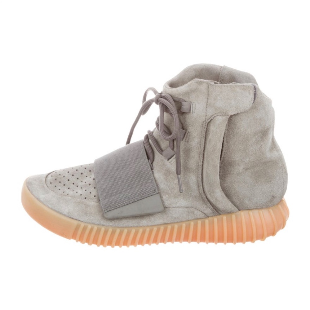 Yeezy boost 750 light glow in the dark sneakers.